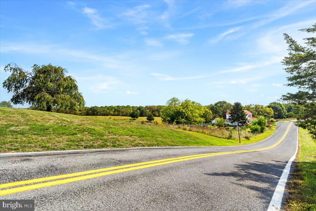 4014 Resley Road Hancock, MD 21750 - Photo 4 of 39 a view of a swimming pool with a yard