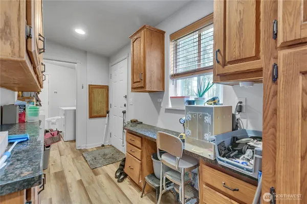 a kitchen with stainless steel appliances granite countertop a stove a sink dishwasher and cabinets