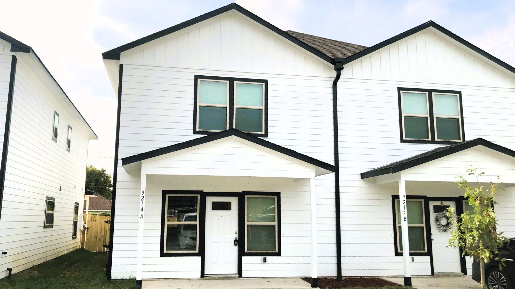 a view of a house with entrance and windows