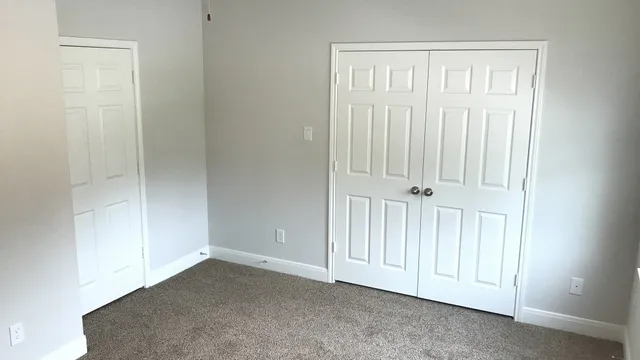 an empty room with a door