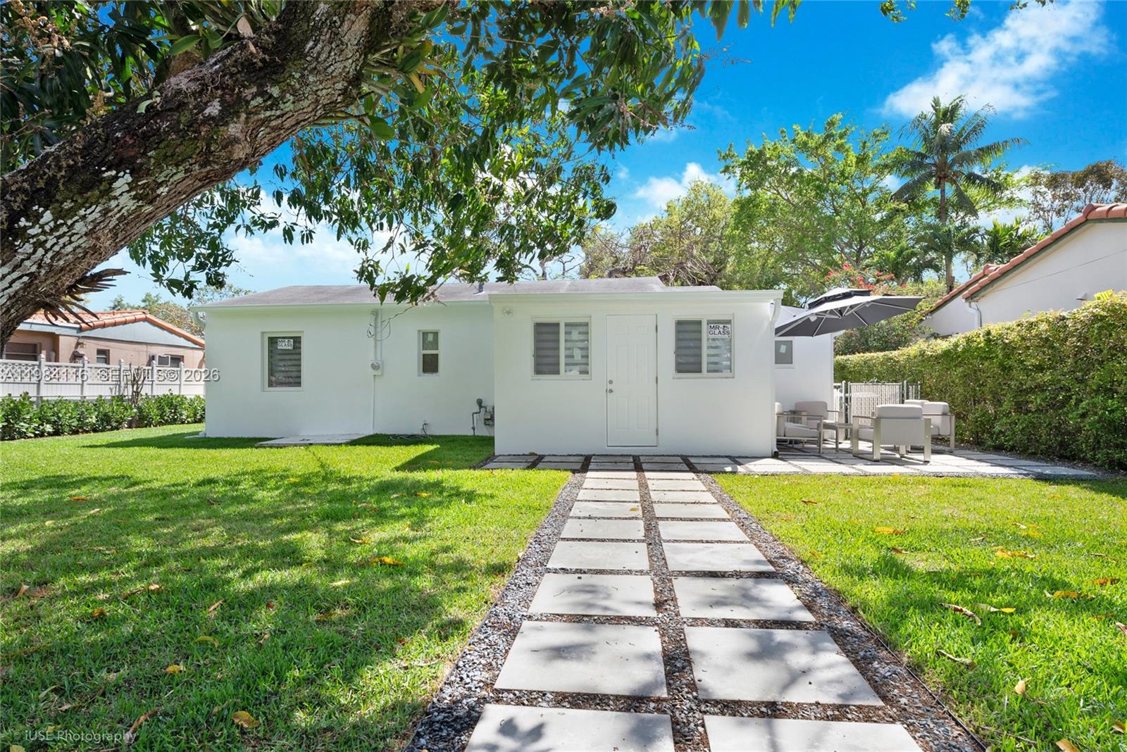 6337 Southwest 11th Street West Miami, FL 33144 - Photo 28 of 28 a front view of a house with a yard