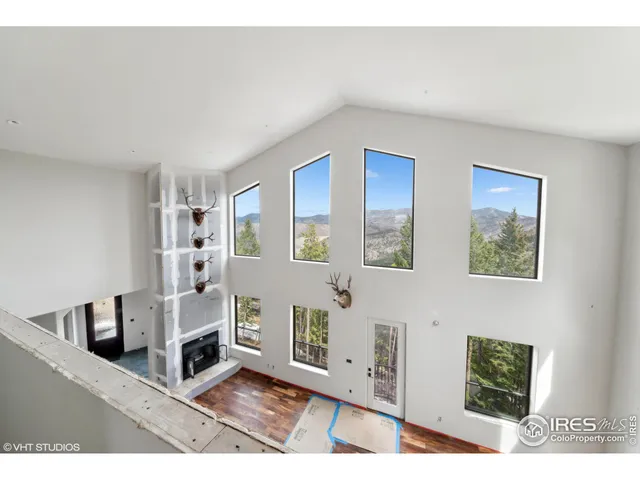 a living room with furniture and natural light