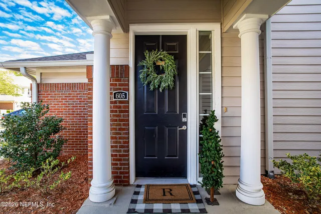 a view of a entryway door front of house