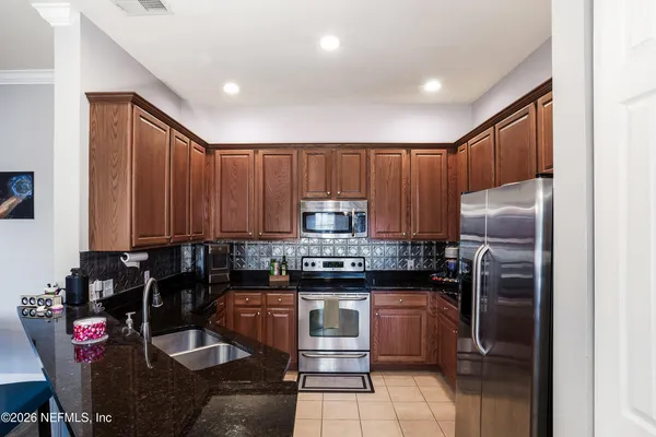 $320,000 | 2045 Secret Garden Lane, Unit 605, Fleming Island, FL 32003