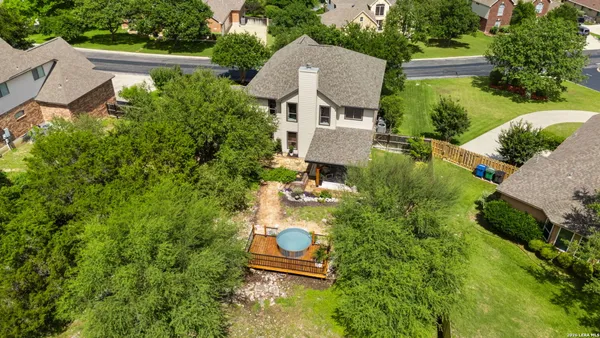 an aerial view of a house with a garden