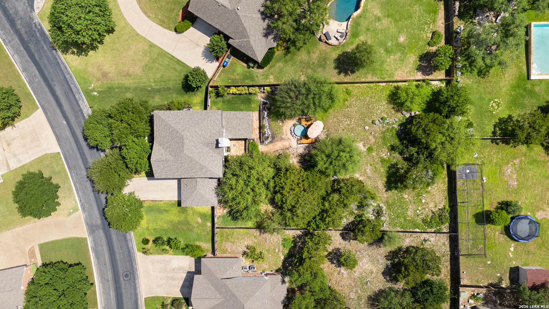 14507 John David Helotes, TX 78023 - Photo 33 of 52 an aerial view of residential house with outdoor space and trees all around