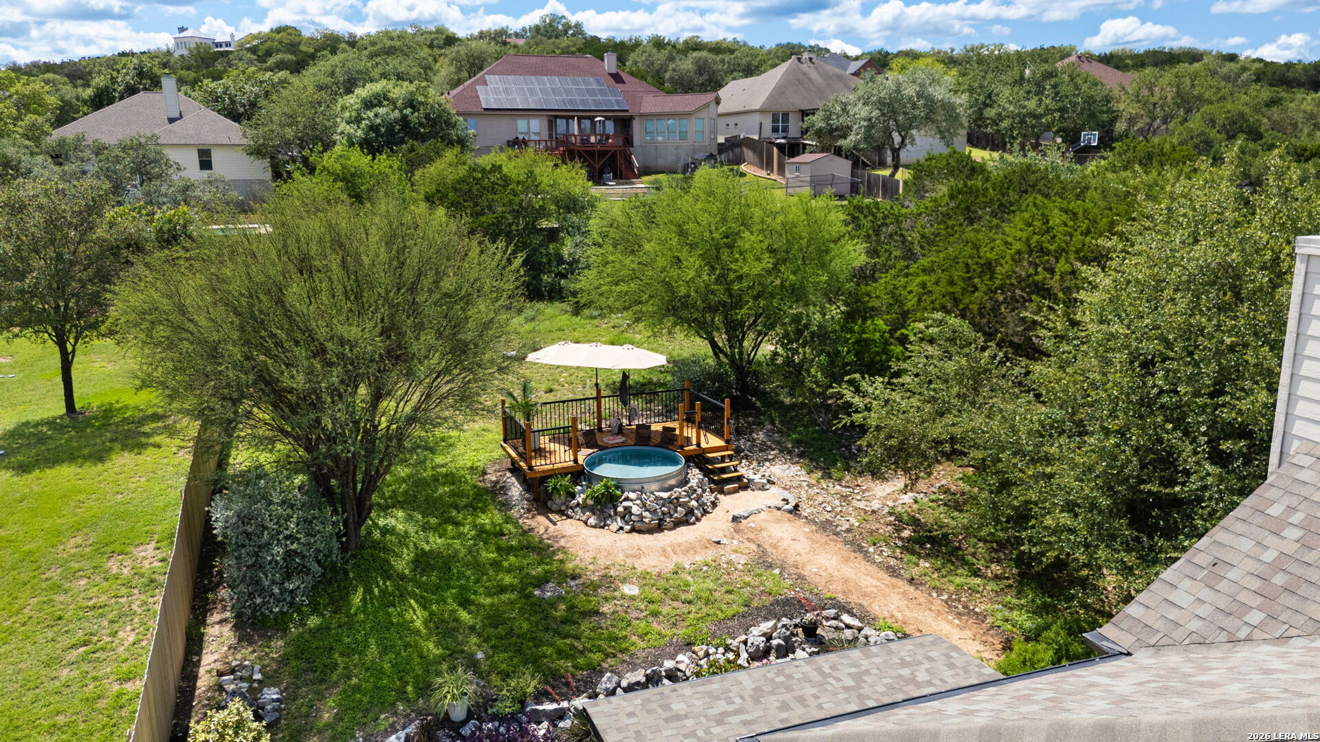14507 John David Helotes, TX 78023 - Photo 34 of 52 an aerial view of a house with a yard basket ball court and outdoor seating