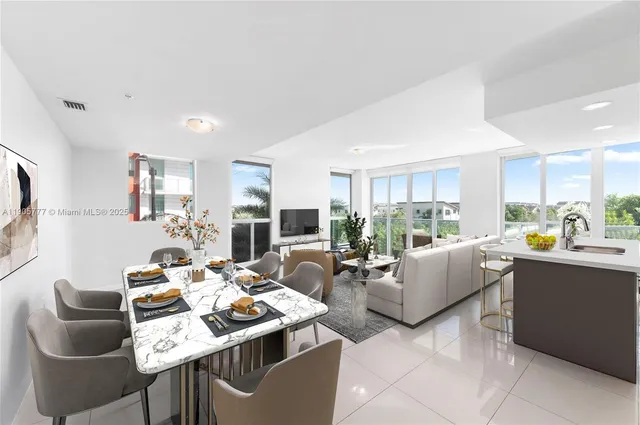 a living room with furniture and a table