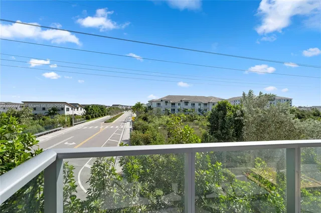 a view of a balcony with an outdoor space