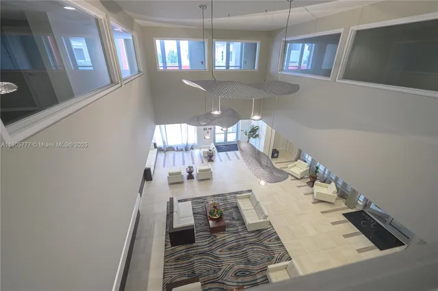 a view of a living room and dining room