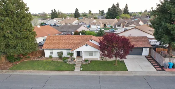 a view of a house with a garden