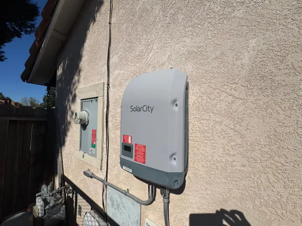 a living room with lots of furniture and a chandelier
