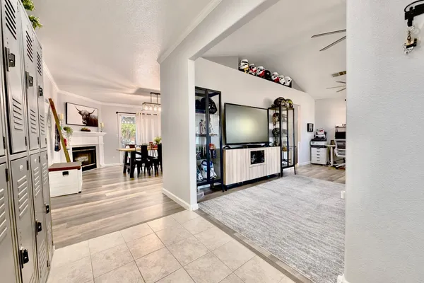 a view of a hallway with living room