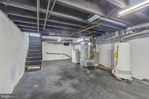 a car parked in front of a brick building