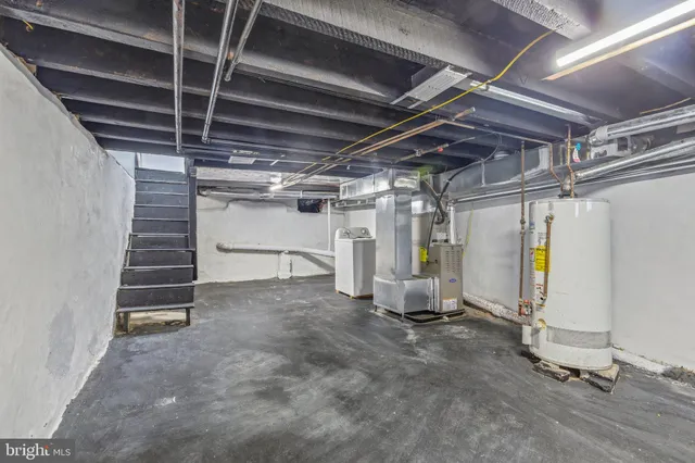 a car parked in front of a brick building