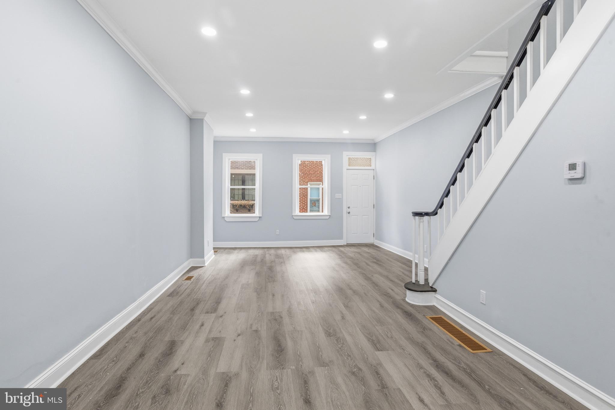 625 Cantrell Street Philadelphia, PA 19148 - Photo 2 of 15 a view of empty room with wooden floor and fan