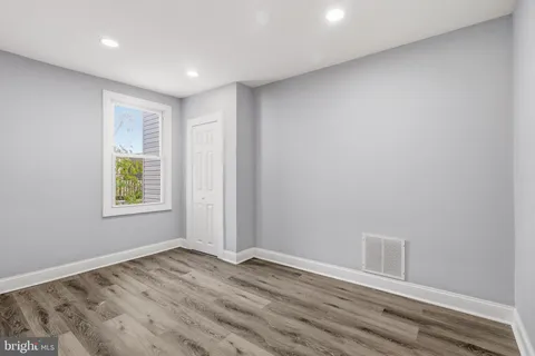 a view of storage and utility room with washer and dryer