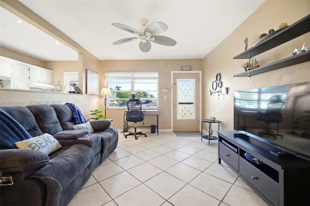 a bedroom with double bed and a window
