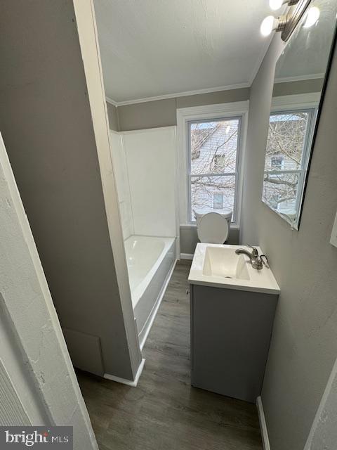 110 Milburn Street Elkton, MD 21921 - Photo 6 of 7 a bathroom with a sink and mirror with bathtub