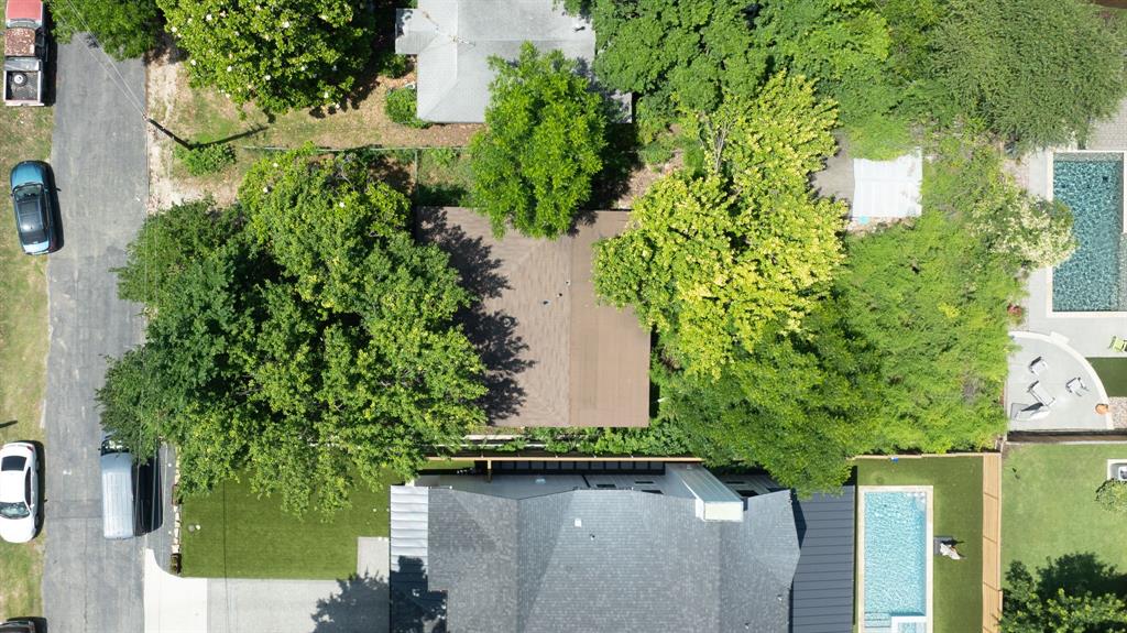 1805 Lucerne Street Dallas, TX 75214 - Photo 2 of 10 an aerial view of a house with a yard and large trees