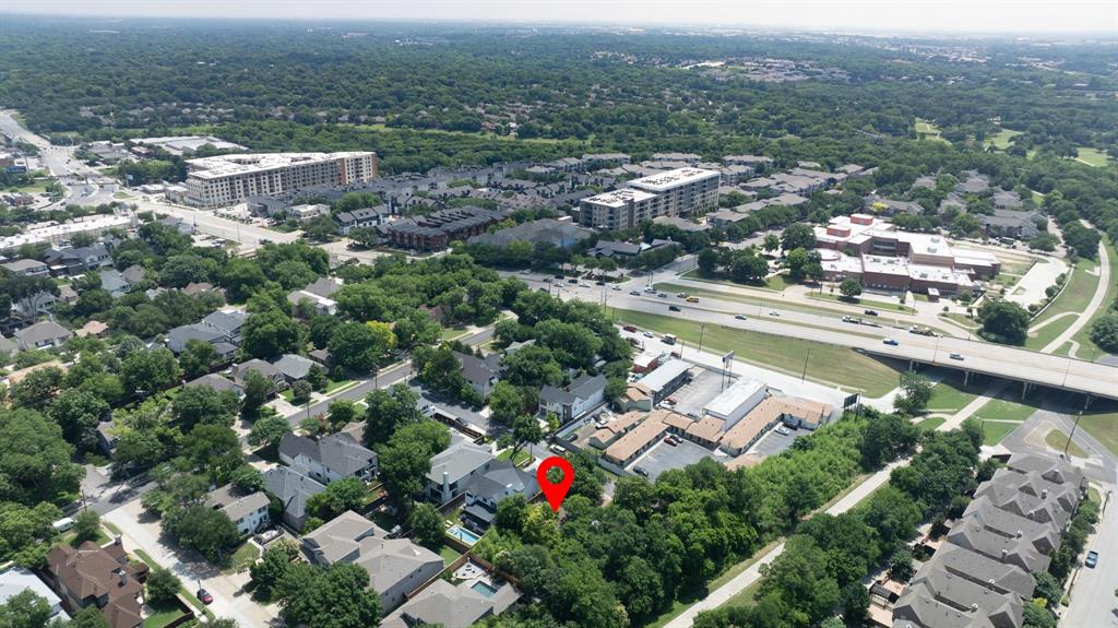 1805 Lucerne Street Dallas, TX 75214 - Photo 4 of 10 an aerial view of residential houses with outdoor space and swimming pool