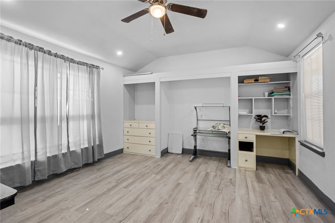 811 Ward Street Marlin, TX 76661 - Photo 23 of 31 a room with furniture and view of bedroom