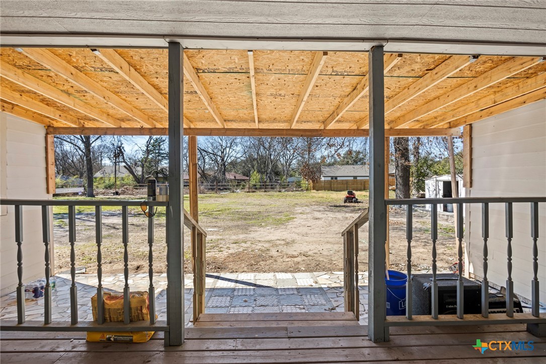 811 Ward Street Marlin, TX 76661 - Photo 26 of 31 a view of a room with wooden floor and windows