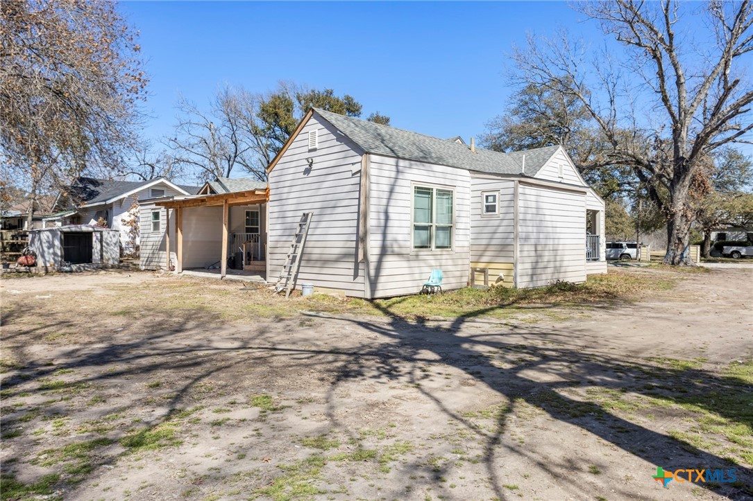 811 Ward Street Marlin, TX 76661 - Photo 29 of 31 a view of a house with a yard