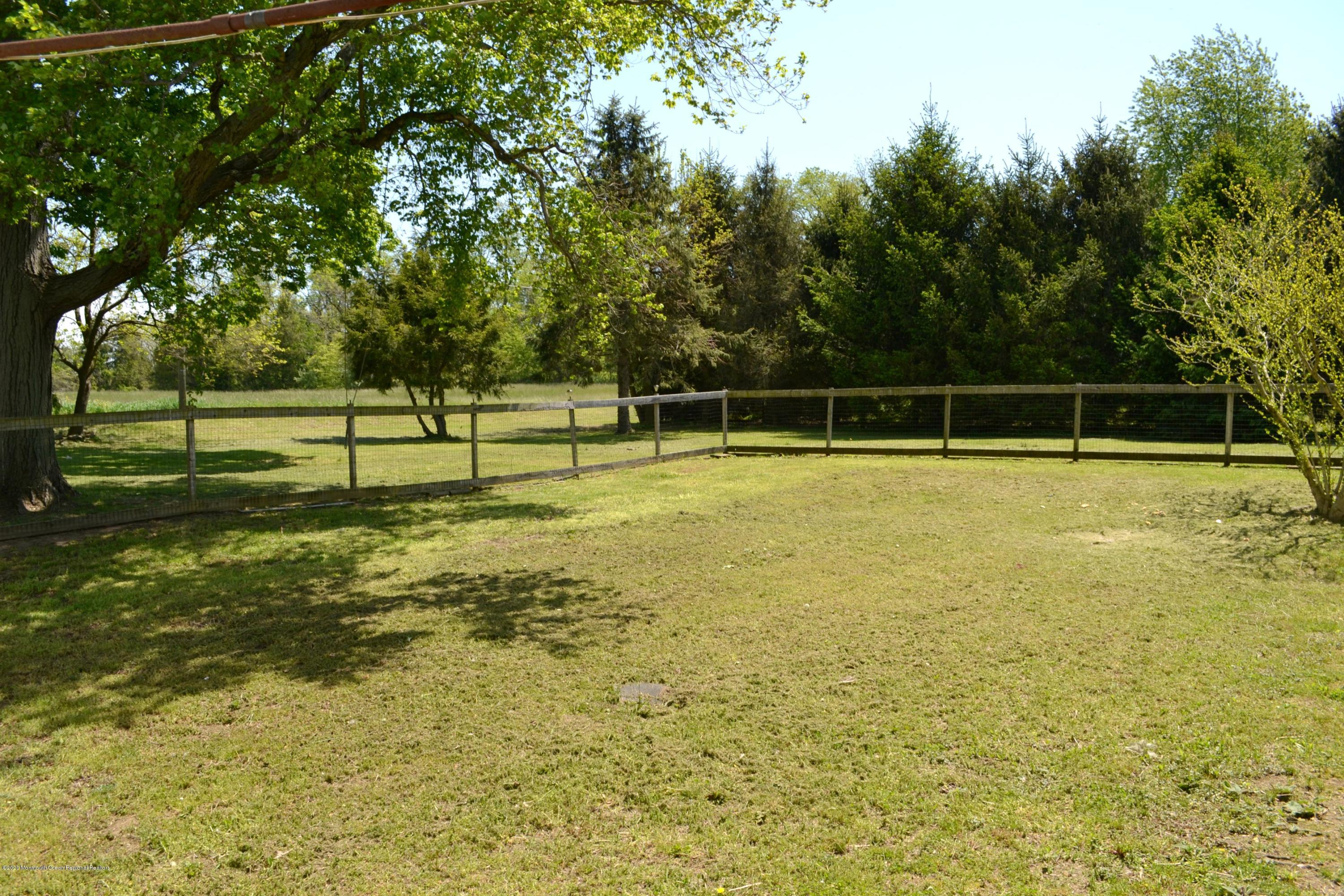 1167 Hedding Road Columbus, NJ 08022 - Photo 13 of 16 a view of a swimming pool with an outdoor space and seating