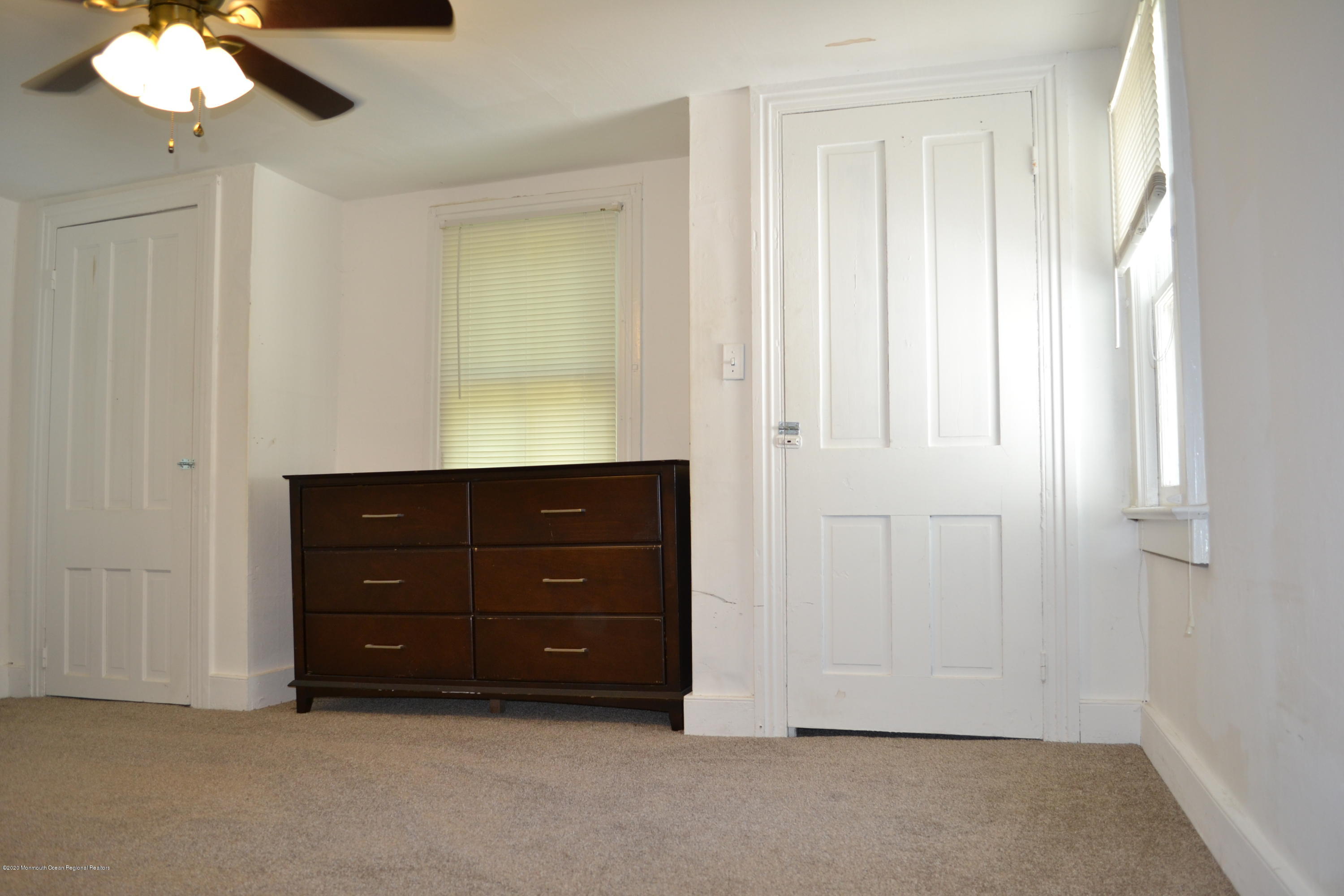1167 Hedding Road Columbus, NJ 08022 - Photo 7 of 16 a room with a cabinet and a mirror