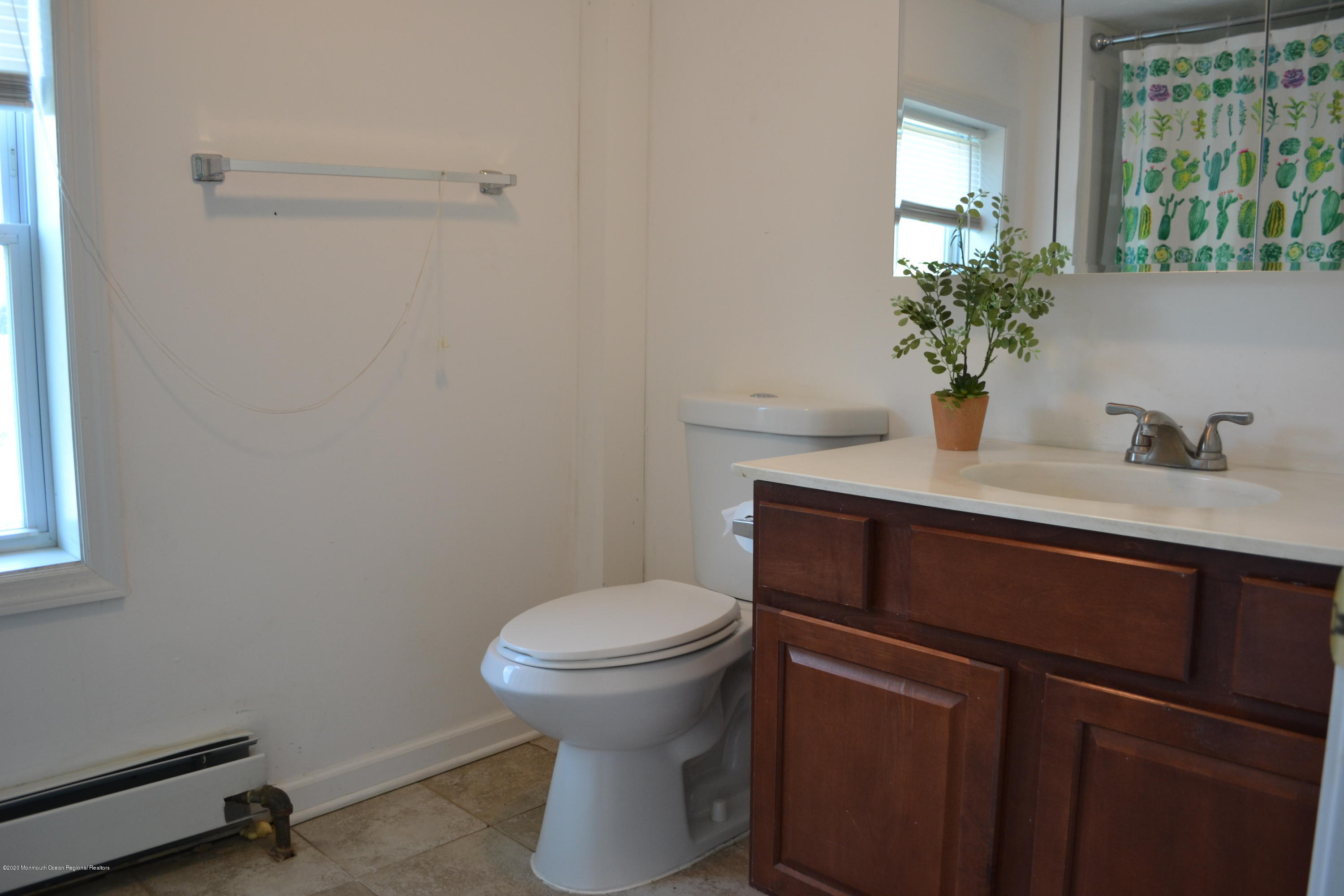 1167 Hedding Road Columbus, NJ 08022 - Photo 10 of 16 a bathroom with a sink toilet and a mirror