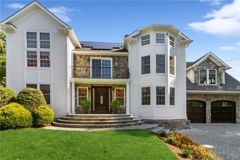 141 Pepper Ridge Road Stamford, CT 06905 - Photo 1 of 1 a front view of a house with a garden