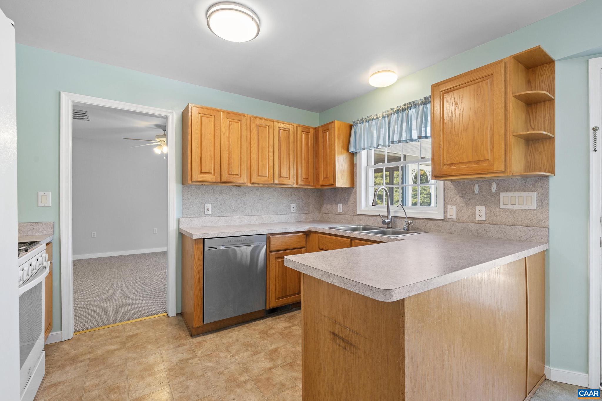 1075 Social Hall Road New Canton, VA 23123 - Photo 57 of 64 a kitchen with a sink cabinets and window