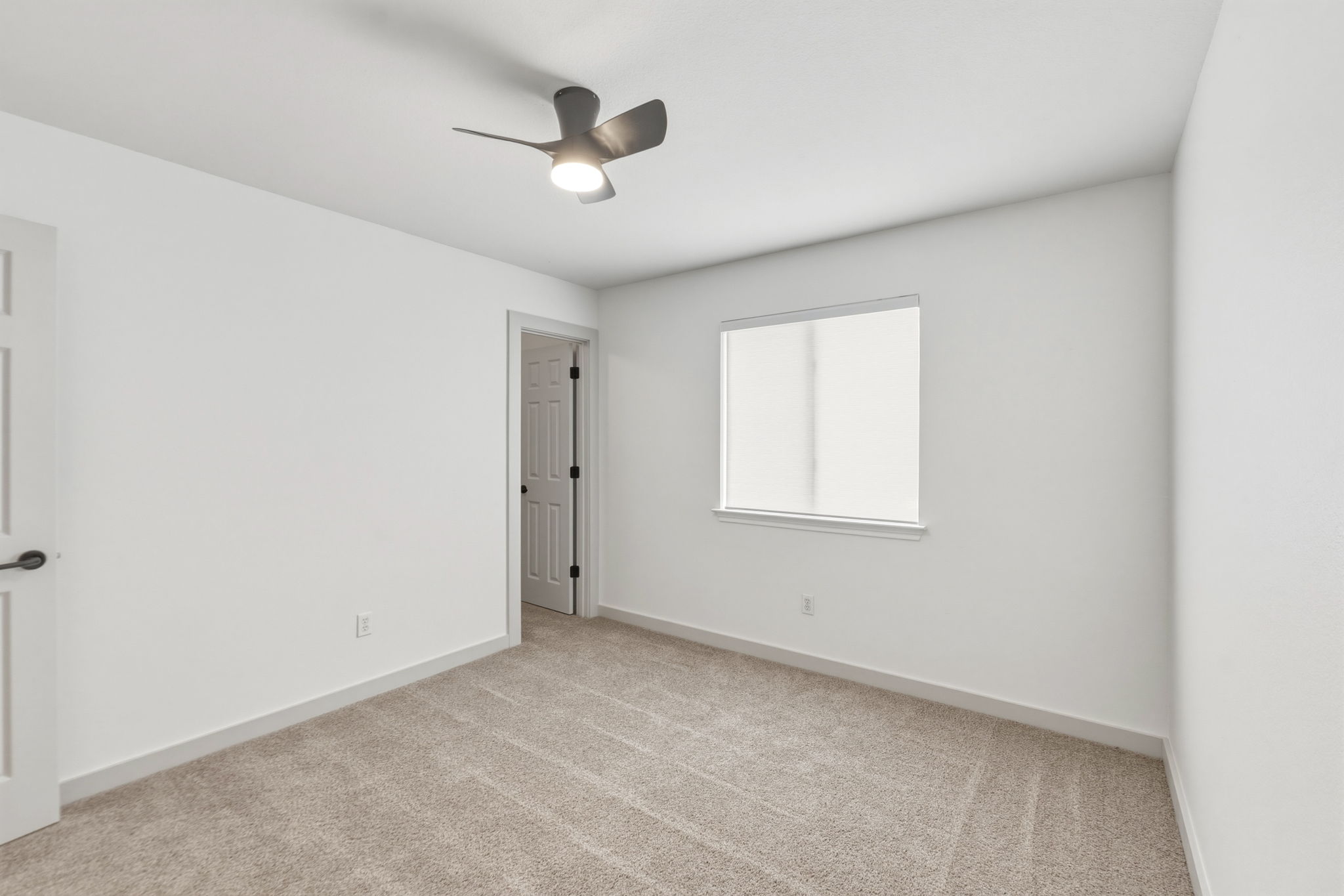 211 Banner Avenue Leander, TX 78641 - Photo 18 of 27 an empty room with a window