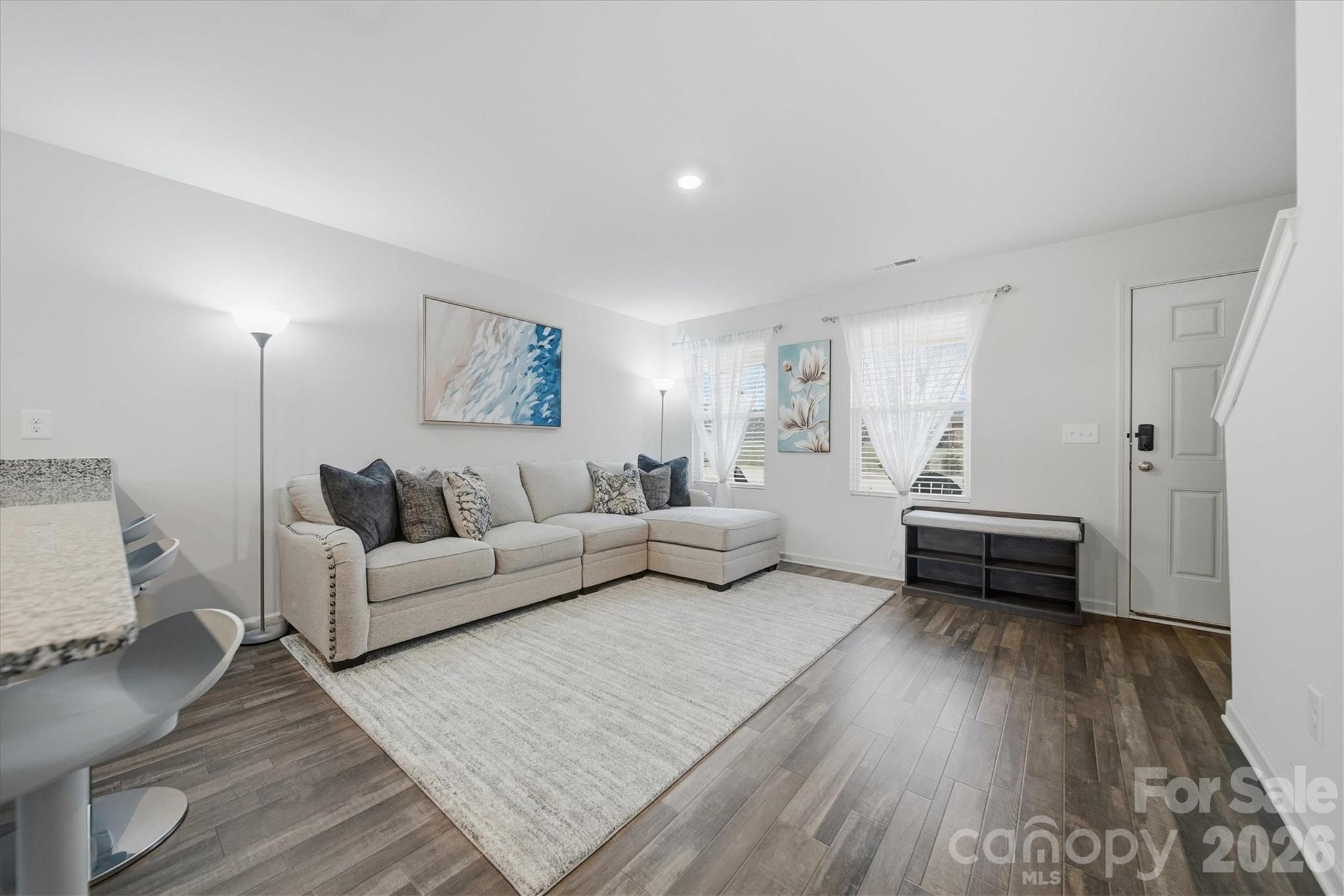 4484 Springs Road Conover, NC 28613 - Photo 11 of 32 a living room with furniture and a wooden floor