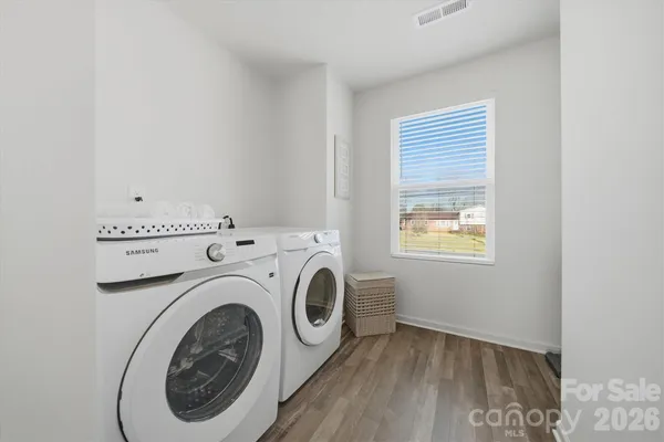 a view of entryway with washer and dryer