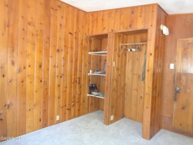 a hallway with closet