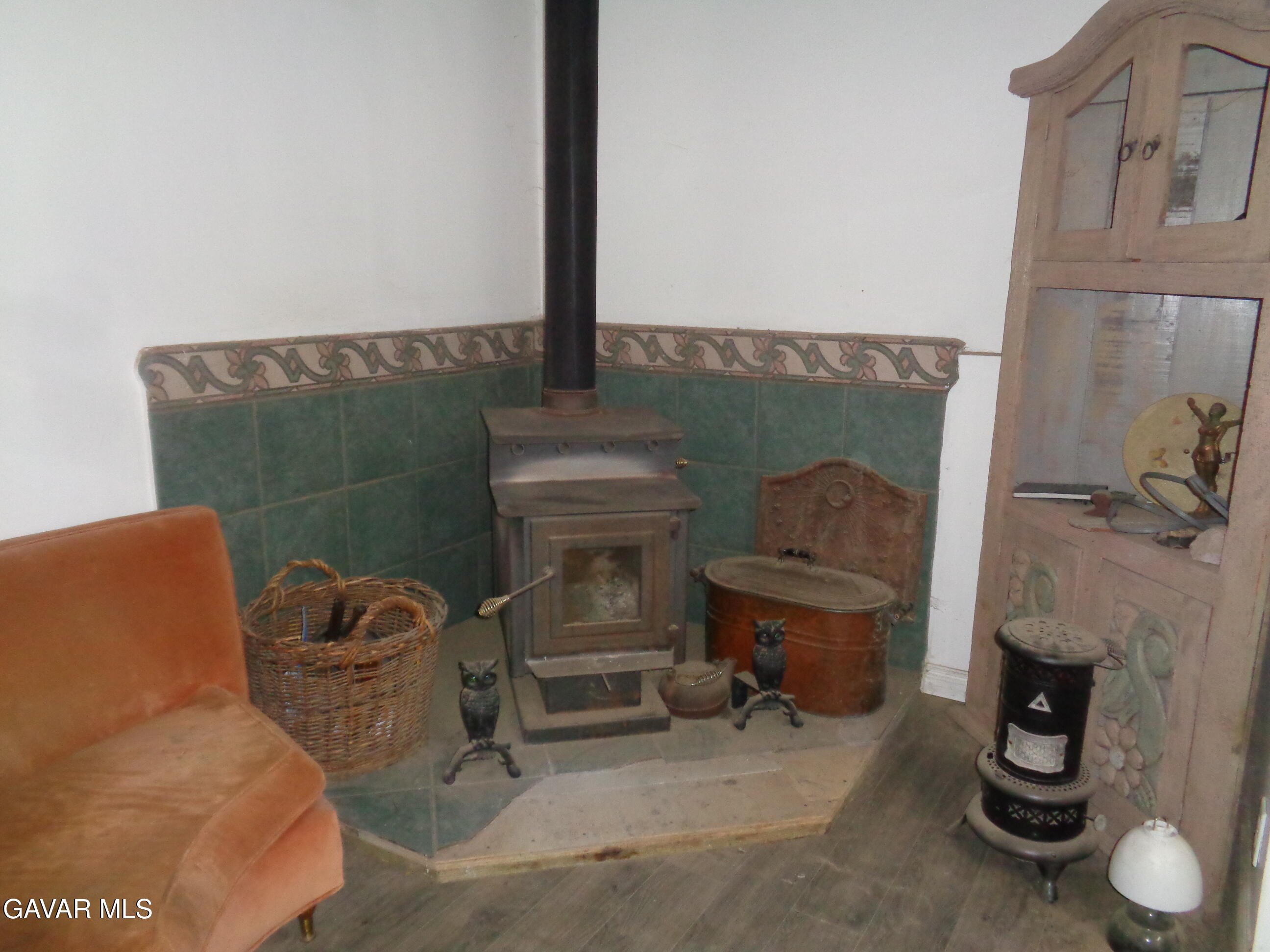 9728 Aveune S10 Street East Littlerock, CA 93543 - Photo 19 of 45 a living room with furniture and a fireplace