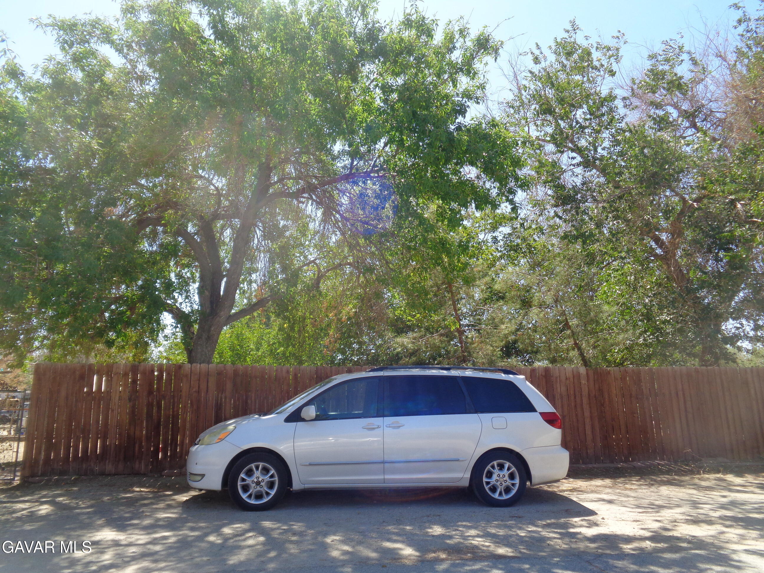 9728 Aveune S10 Street East Littlerock, CA 93543 - Photo 39 of 45 a car parked in a parking lot