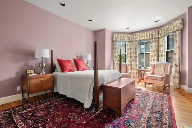 a bed room with a bed and a couch