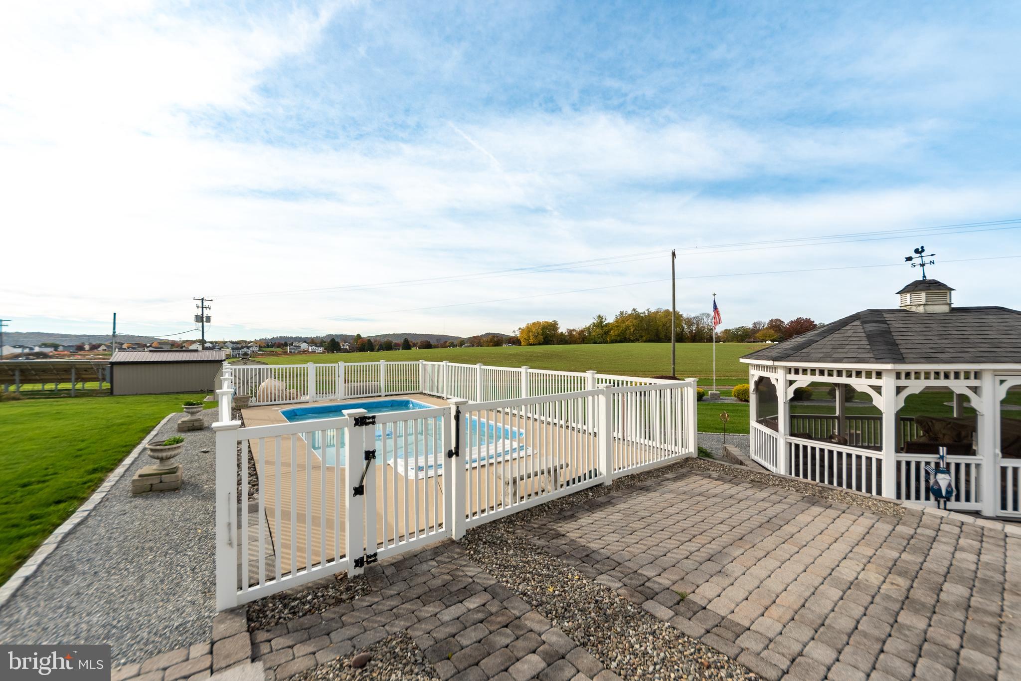 223 Rock Point Road Marietta, PA 17547 - Photo 51 of 63 Fenced in pool area adjacent to patio.