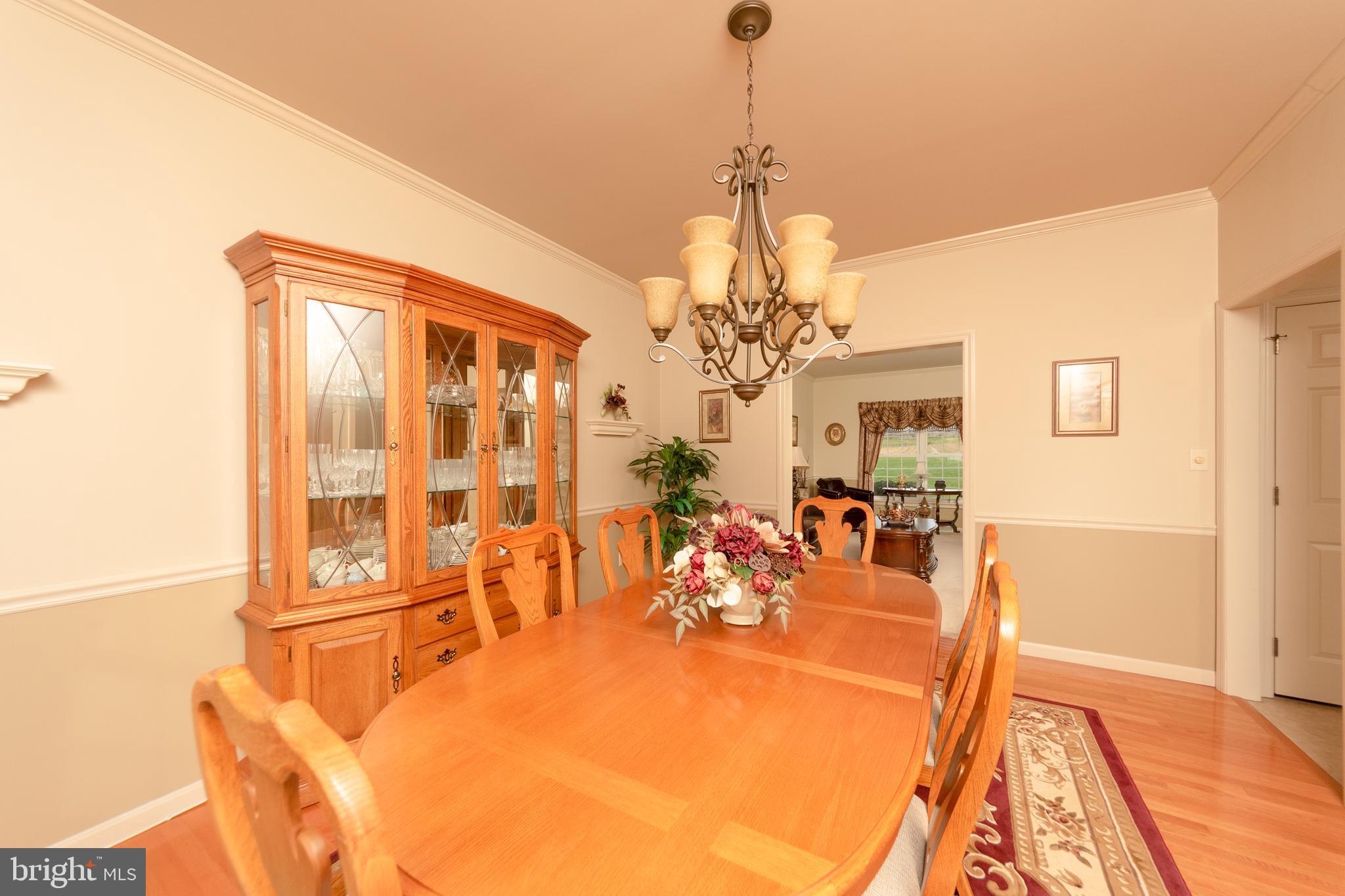 223 Rock Point Road Marietta, PA 17547 - Photo 8 of 63 Spacious room with crown moulding and chair rail.