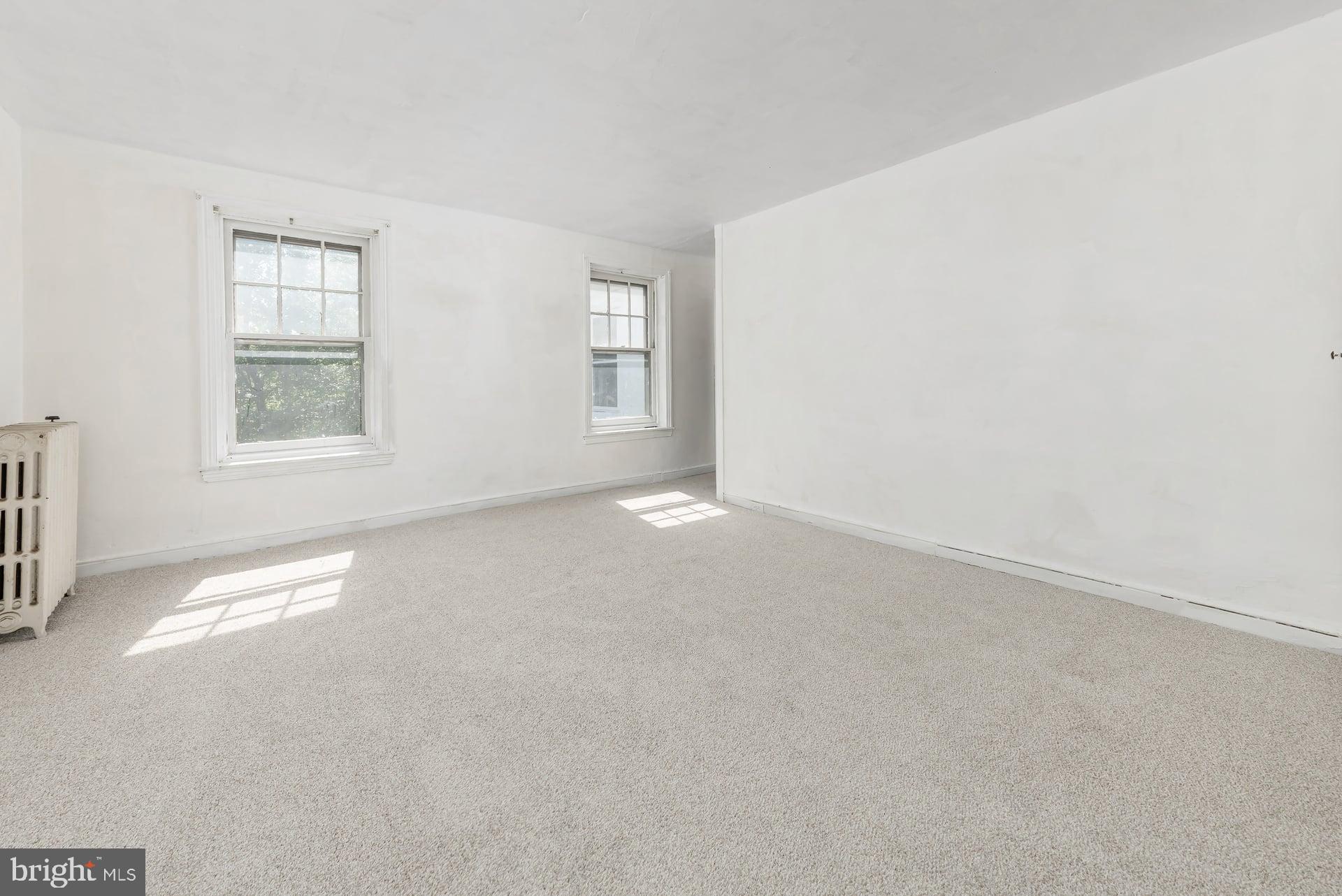 401 West Avenue Delanco, NJ 08075 - Photo 12 of 19 an empty room with windows