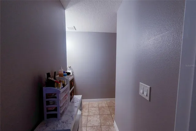 a room with cabinets and dust bin