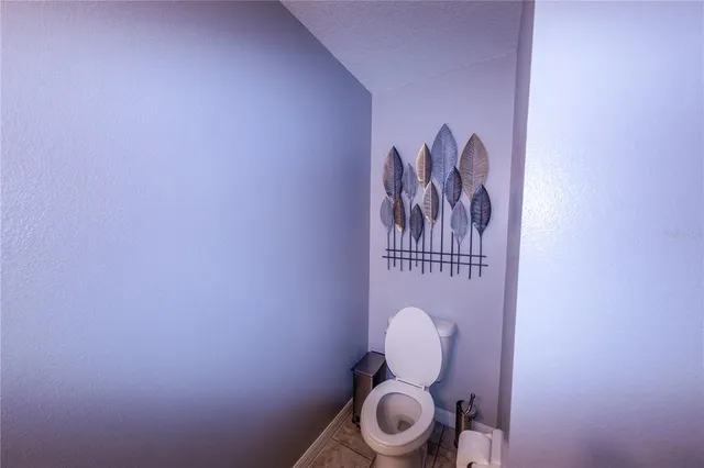 a bathroom with a toilet and a sink