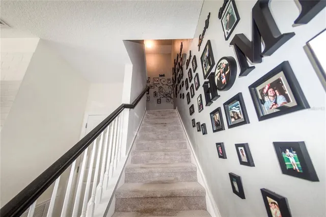 a utility room with dryer and bicycles