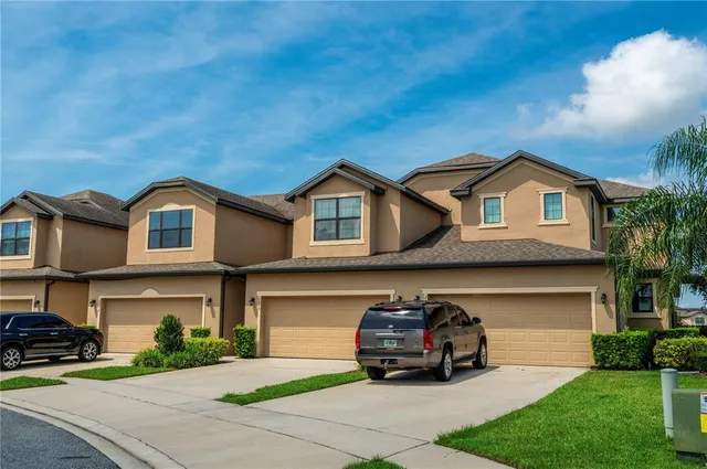 a car parked in front of a house