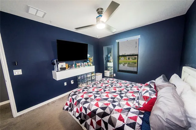 a room with a bed and a window