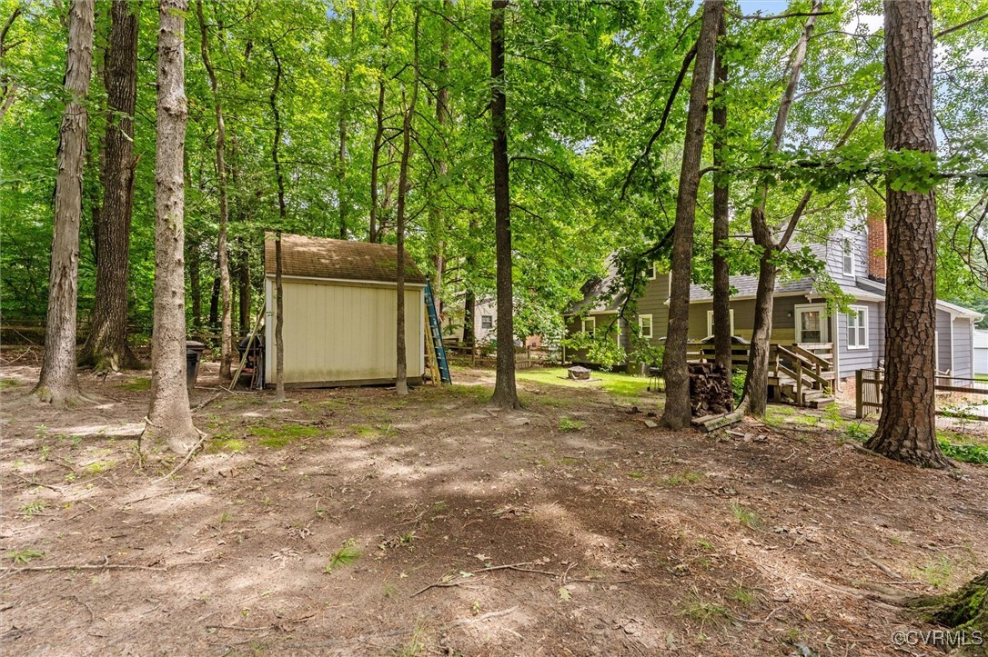 7306 Full Rack Drive Midlothian, VA 23112 - Photo 31 of 32 View of yard with a storage unit