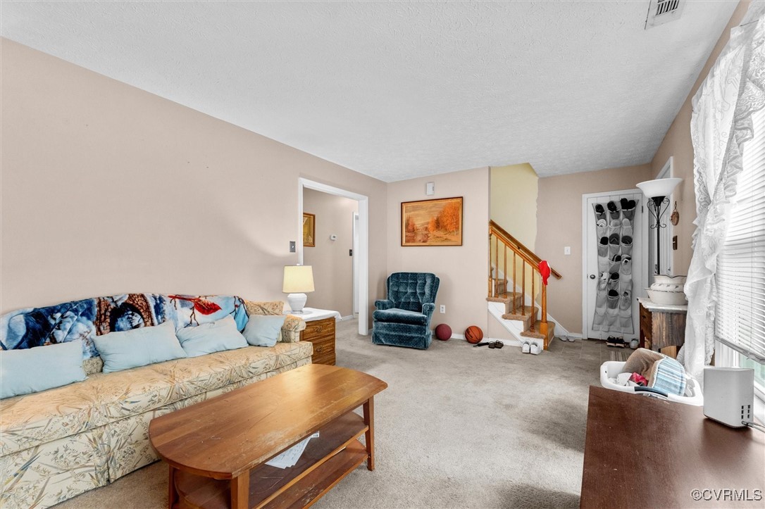 7306 Full Rack Drive Midlothian, VA 23112 - Photo 6 of 32 Living room featuring stairway, carpet floors, and
